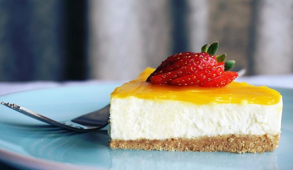 What are the secrets to a silky and rich New York cheesecake?